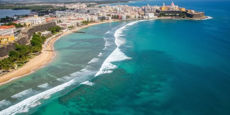 Aerial view of Puerto Rico coastline with turquoise water, Old San Juan colorful buildings.